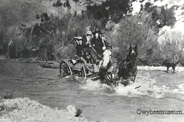 Team and Wagon Crossing Jordan Creek